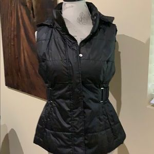 Black quilted vest with removable hood